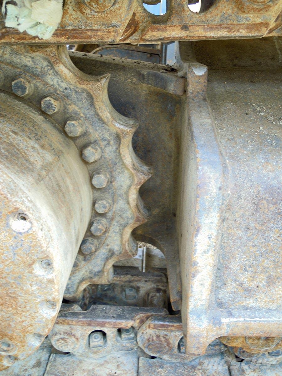 New Holland E 385 Bageri guseničari