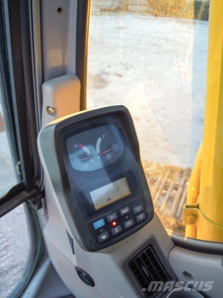 New Holland E215 Bageri guseničari