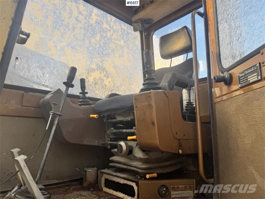CAT 211BLC Bageri guseničari