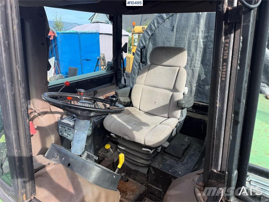 John Deere 1640 الجرارات