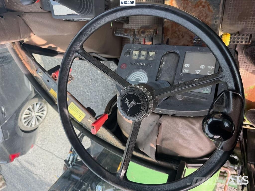 John Deere 1640 الجرارات