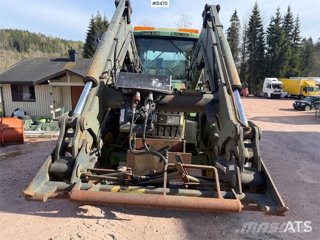 John Deere 6810 الجرارات