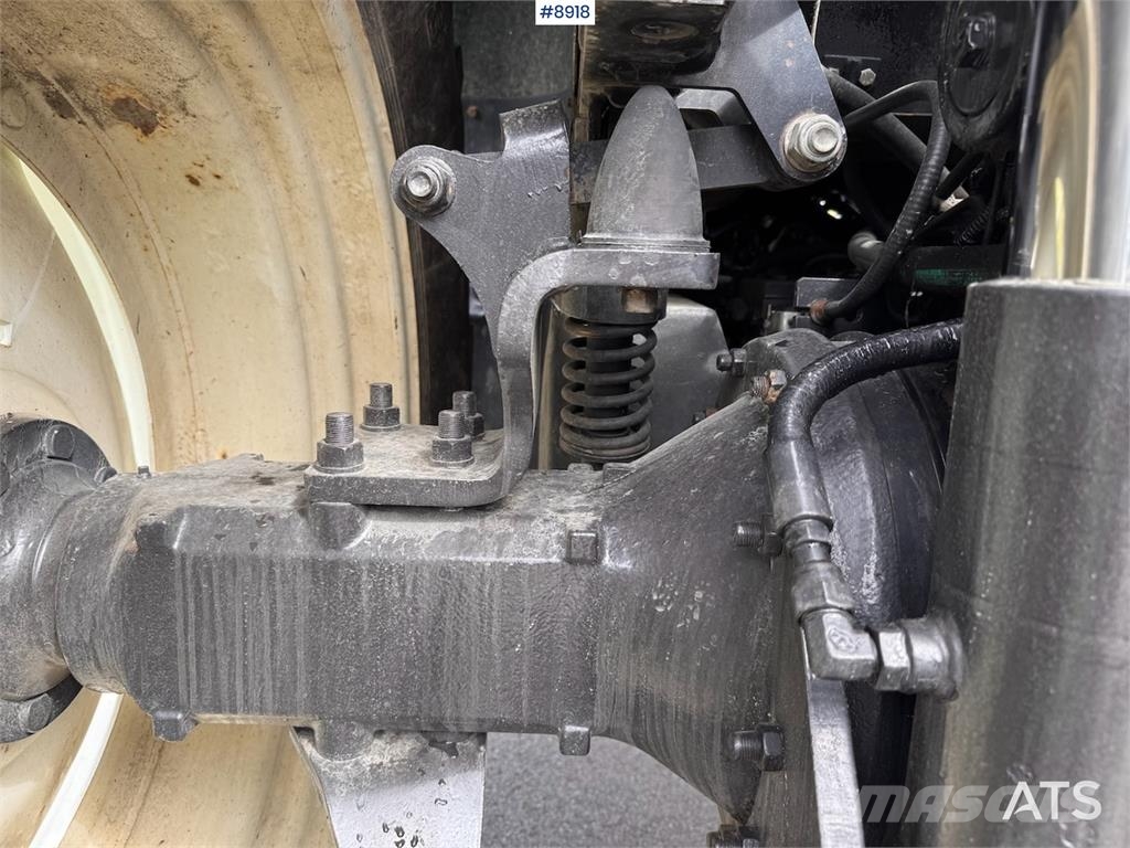 New Holland TS125A Traktory