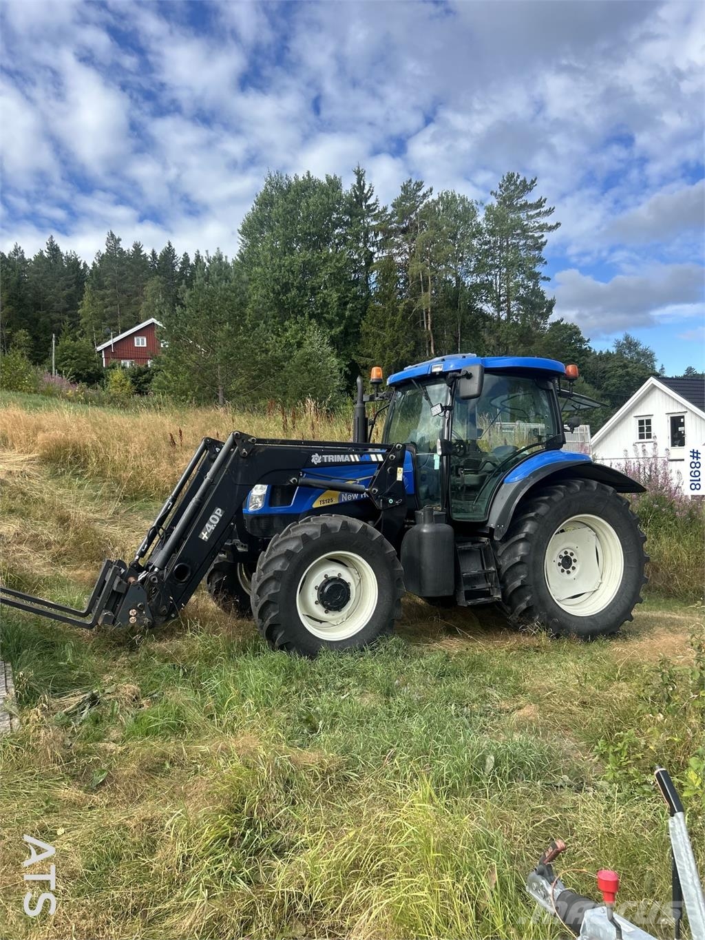 New Holland TS125A Traktory