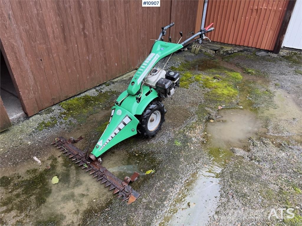 Tohjuls motorslåmaskin ACF-202 مثاقيب
