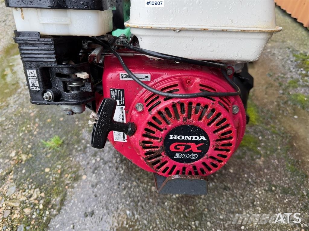 Tohjuls motorslåmaskin ACF-202 مثاقيب