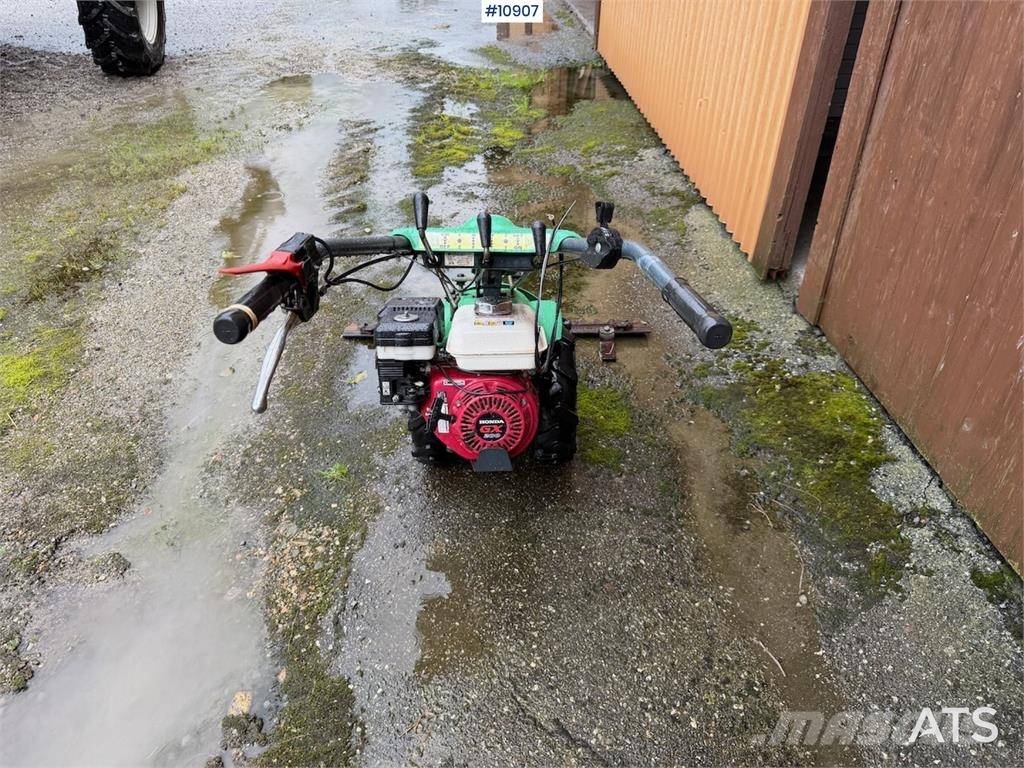 Tohjuls motorslåmaskin ACF-202 مثاقيب