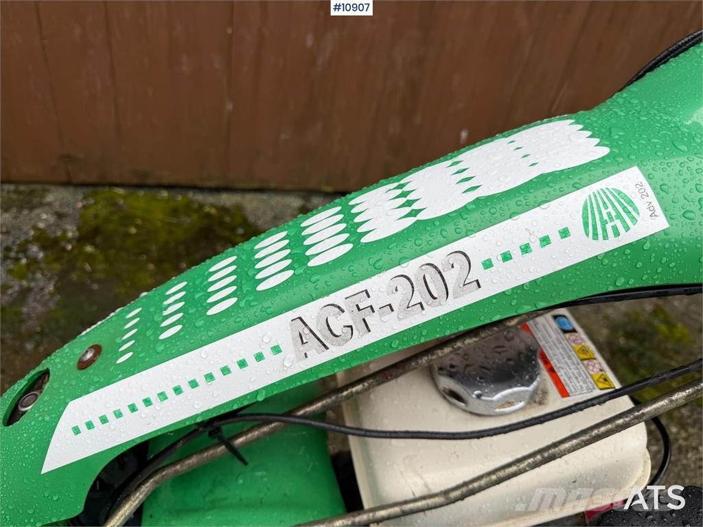Tohjuls motorslåmaskin ACF-202 مثاقيب