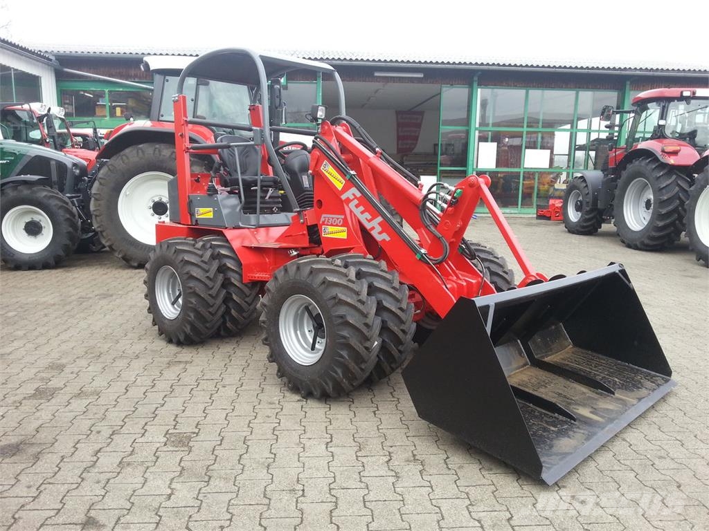 Fuchs F 1300 mit 3xDW, Tandempumpe, Plaentenachsen uvm Homlokrakodók és kotrók