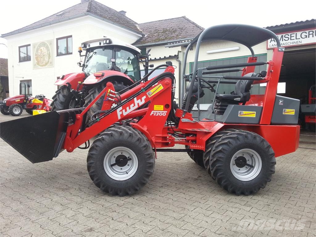 Fuchs F 1300 mit 3xDW, Tandempumpe, Plaentenachsen uvm Homlokrakodók és kotrók