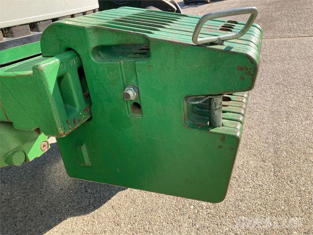 John Deere 6400 الجرارات