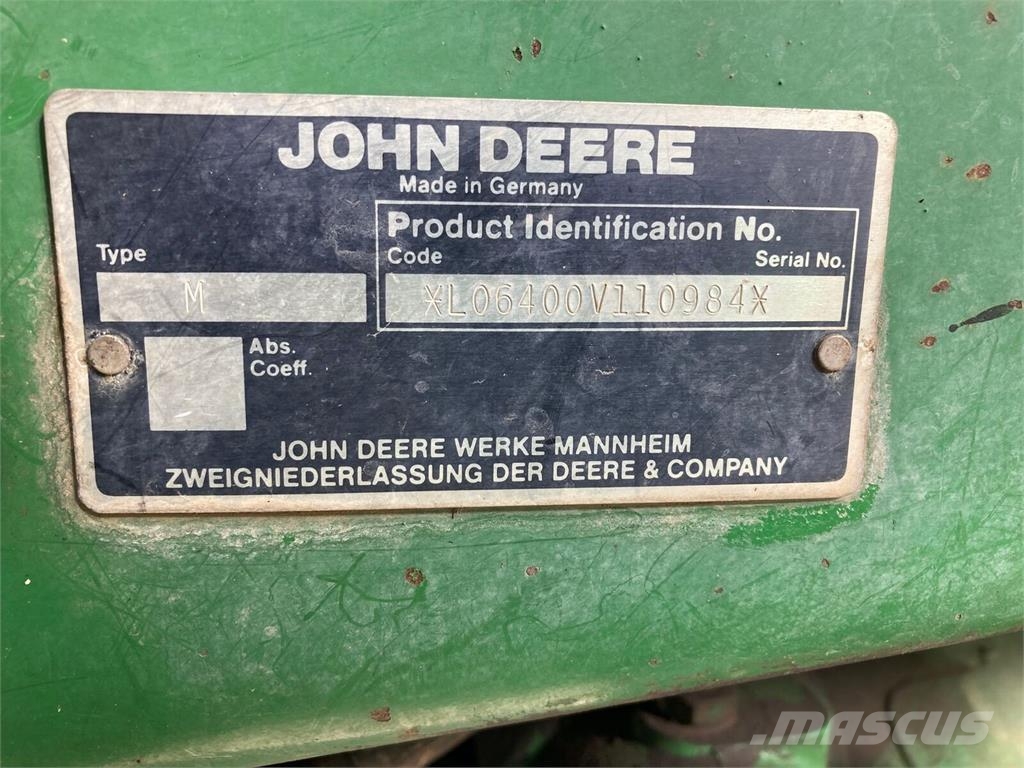 John Deere 6400 الجرارات