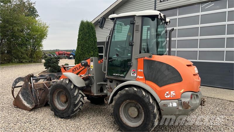 Atlas 65 Super. pallegafler og skovl med overfald Cargadoras sobre ruedas