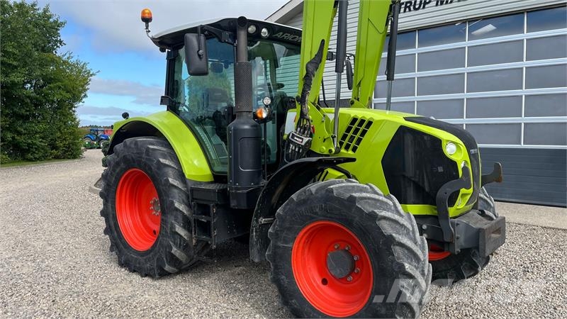 CLAAS Arion 610 Med frontlæsser Traktorok