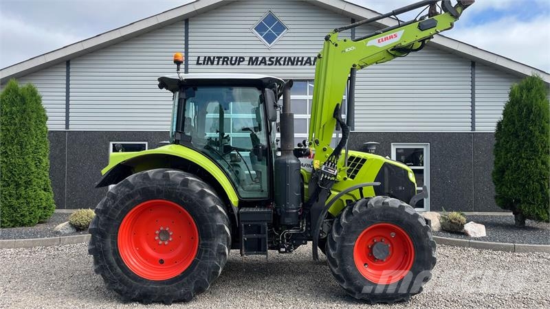 CLAAS Arion 610 Med frontlæsser Traktorok