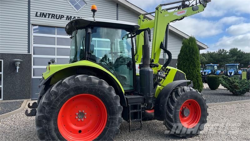 CLAAS Arion 610 Med frontlæsser Traktorok