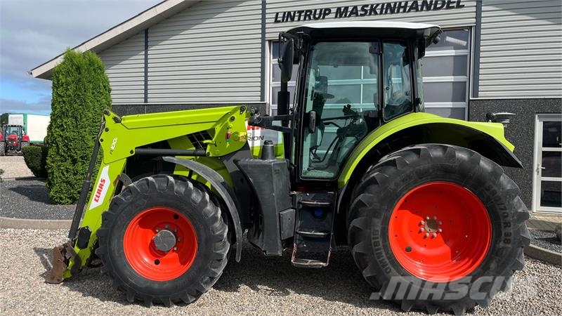 CLAAS Arion 610 Med frontlæsser Traktorok