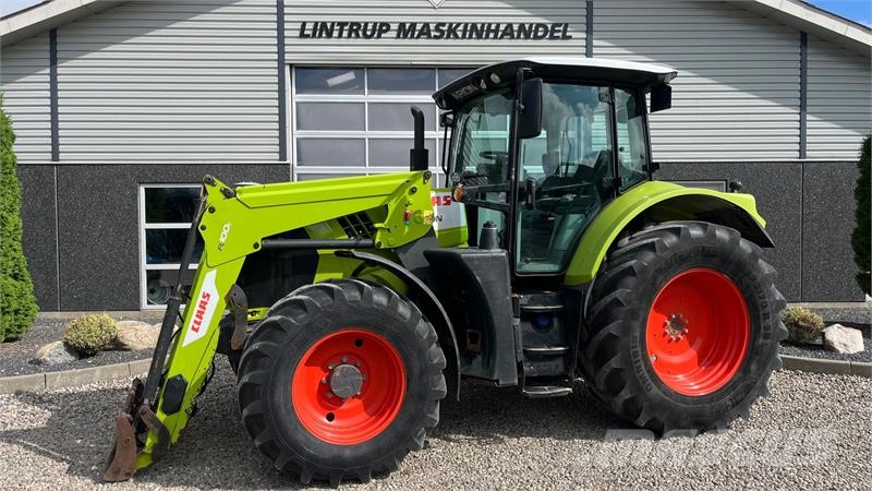 CLAAS Arion 610 Med frontlæsser Traktorok