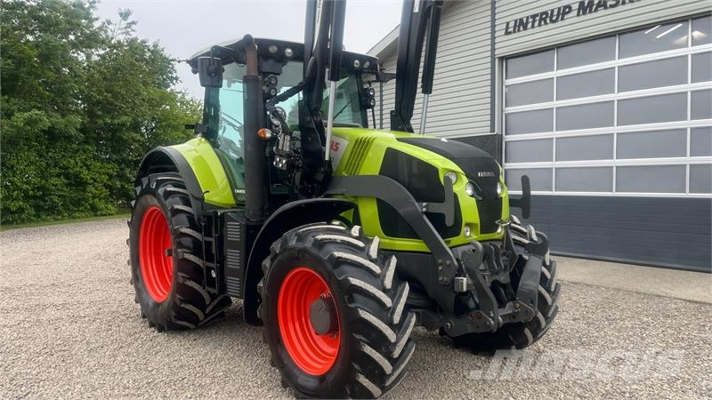 CLAAS Axion 810 CMATIC Med frontlift og frontlæsser 트랙터