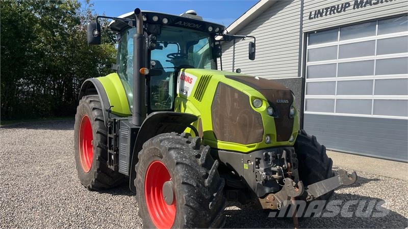 CLAAS Axion 830 Cebis med frontlift Traktori