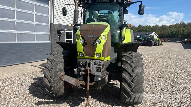 CLAAS Axion 830 Cebis med frontlift Traktori