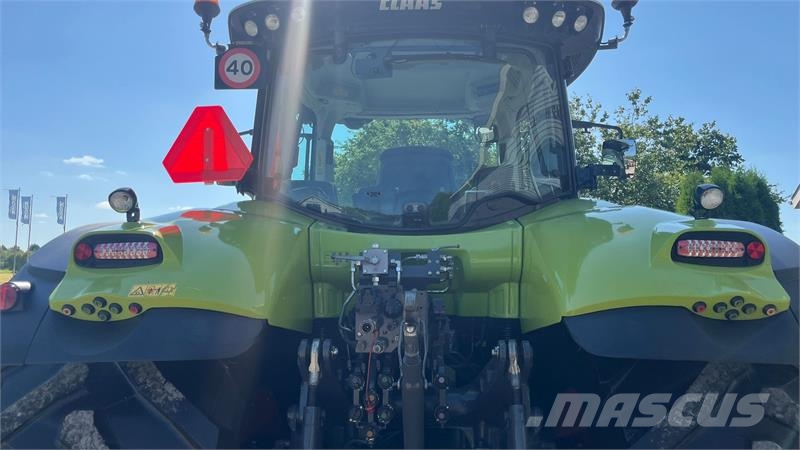 CLAAS AXION 850 CMatic med frontlift Traktorok