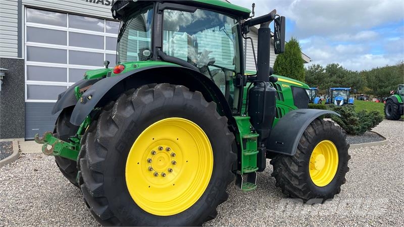 John Deere 6215R AP med frontlift Traktorer