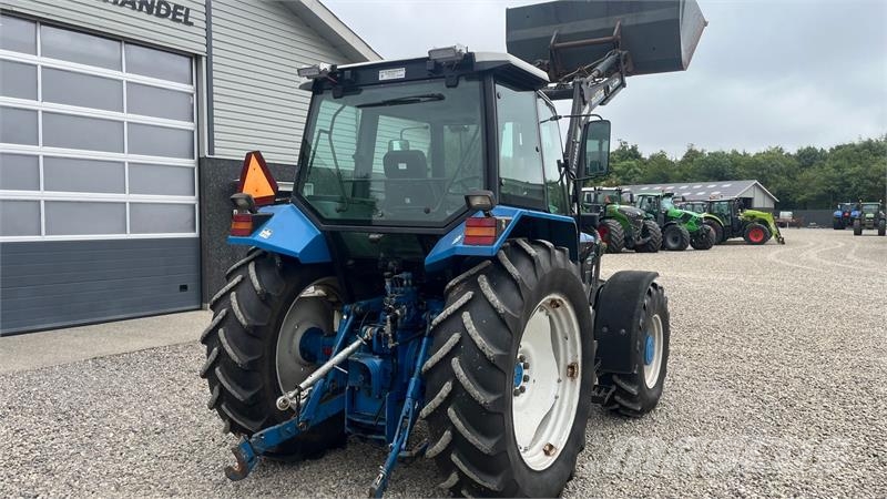 New Holland 7740 SLE med frontlæsser Tractors