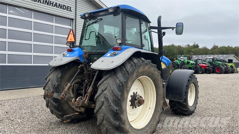 New Holland TM190 SS med frontlift Traktoren