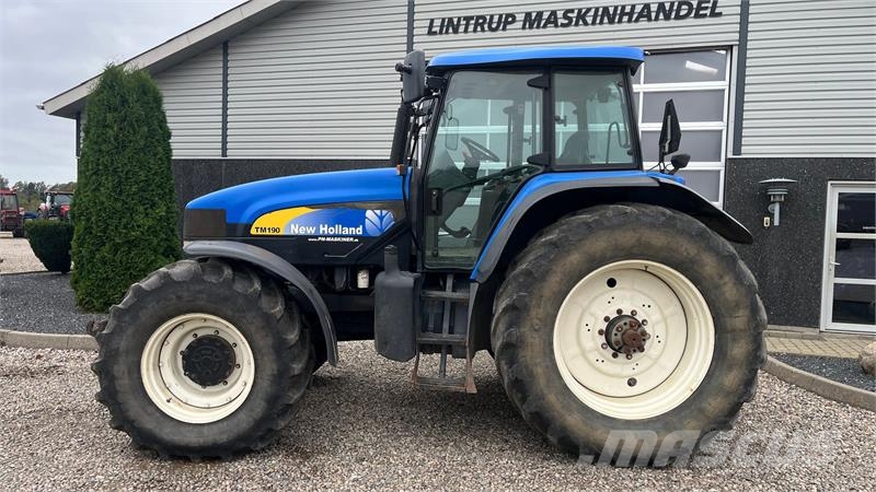 New Holland TM190 SS med frontlift Traktoren