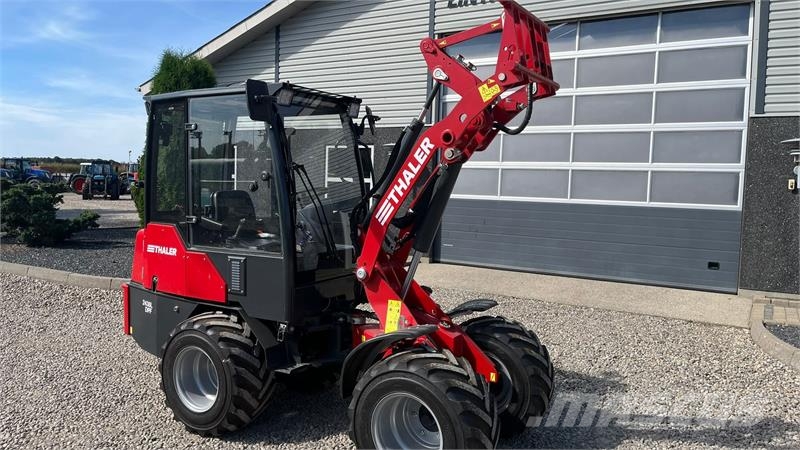 Thaler 2438L DPF Kabine og brede hjul Mini utovarivači