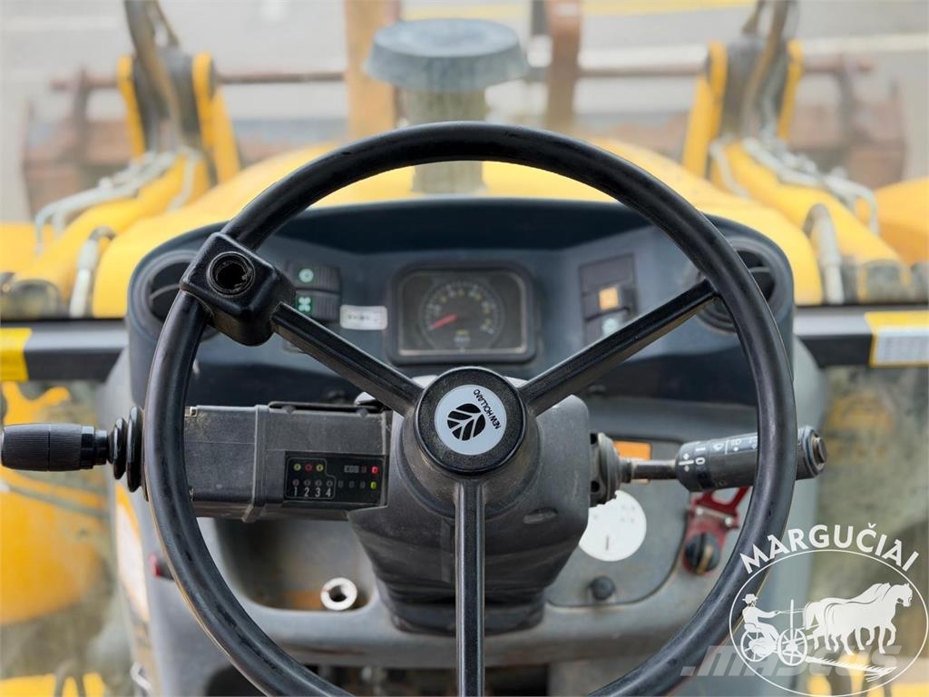 New Holland LB 115.B لوادر وحفارات أمامية