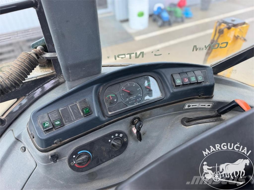 New Holland LB 115.B لوادر وحفارات أمامية