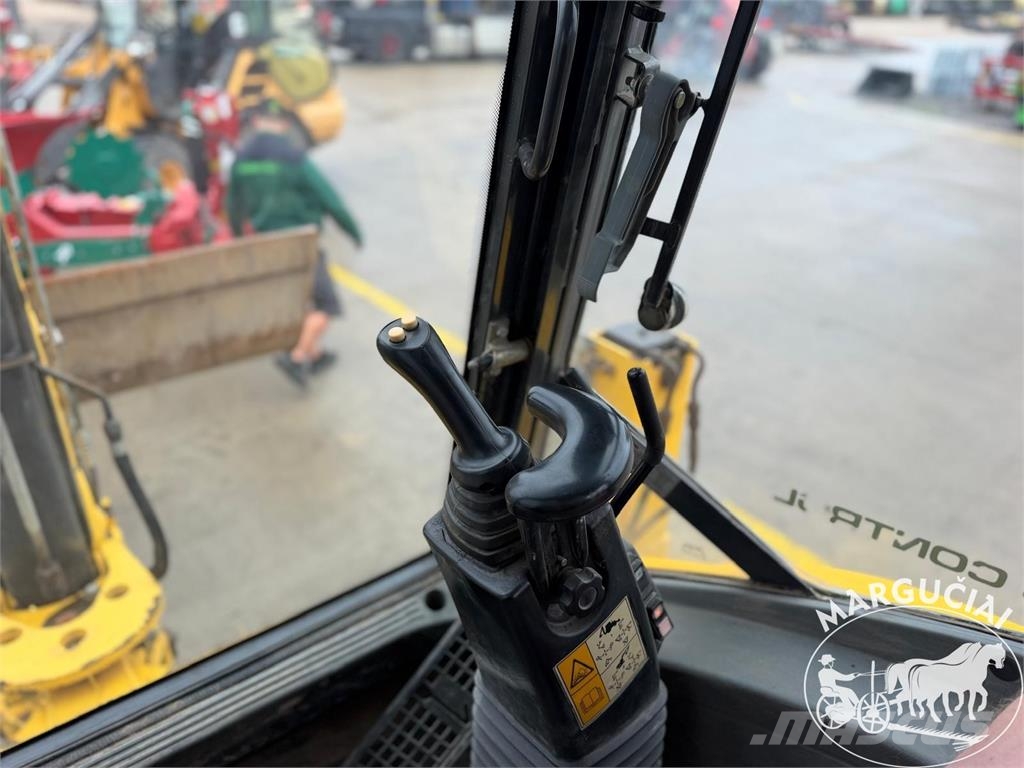 New Holland LB 115.B لوادر وحفارات أمامية