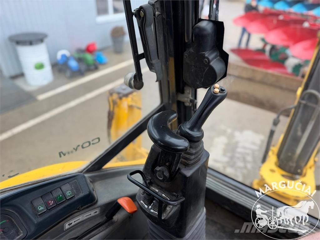 New Holland LB 115.B لوادر وحفارات أمامية