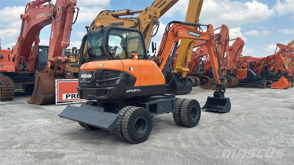 Doosan DX57W-5 حفارات بعجل