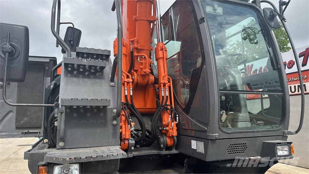 Hitachi ZX140WT-3 حفارات بعجل