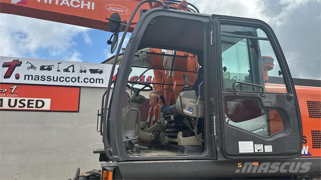 Hitachi ZX140WT-3 حفارات بعجل