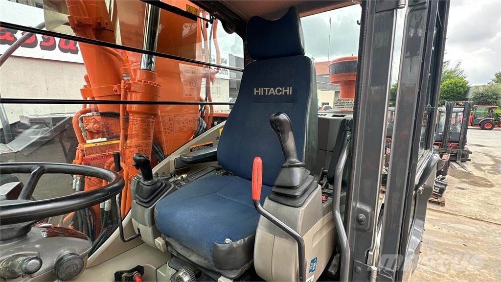 Hitachi ZX140WT-3 حفارات بعجل