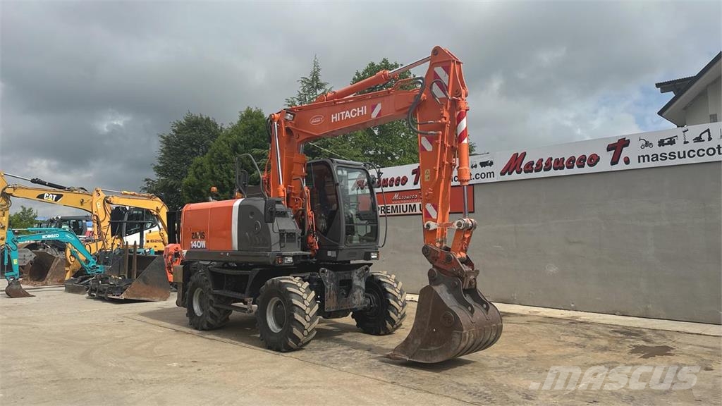 Hitachi ZX140WT-3 حفارات بعجل