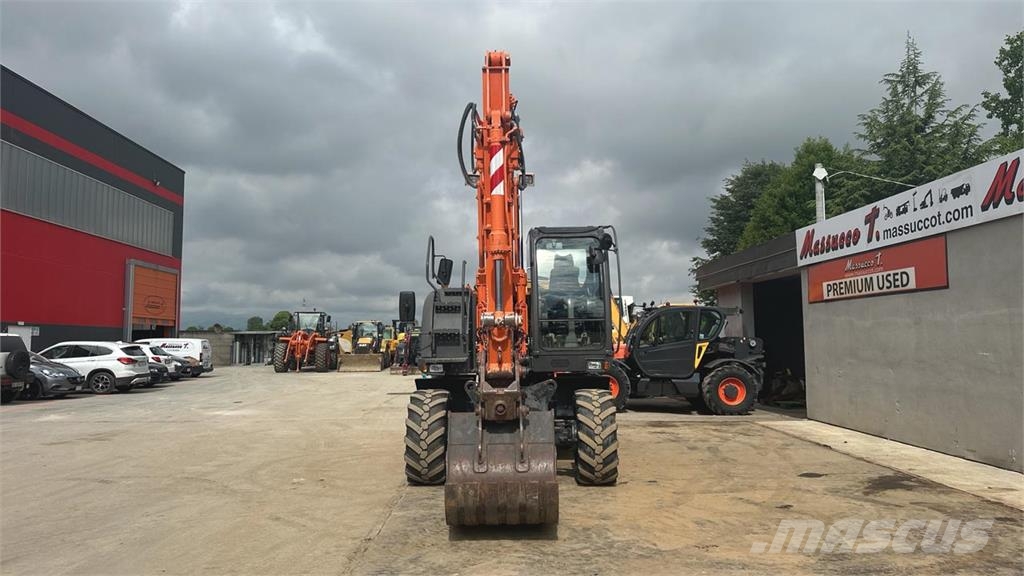 Hitachi ZX140WT-3 حفارات بعجل