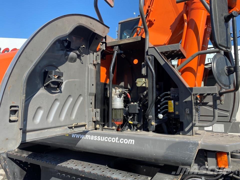 Hitachi ZX210W-3 حفارات بعجل