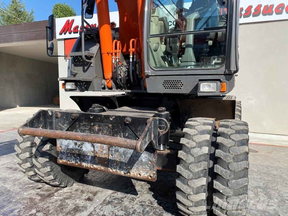 Hitachi ZX210W-3 حفارات بعجل