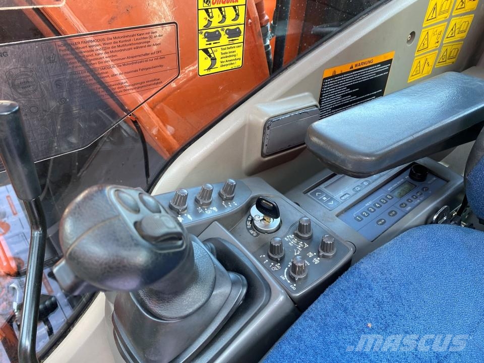 Hitachi ZX210W-3 حفارات بعجل