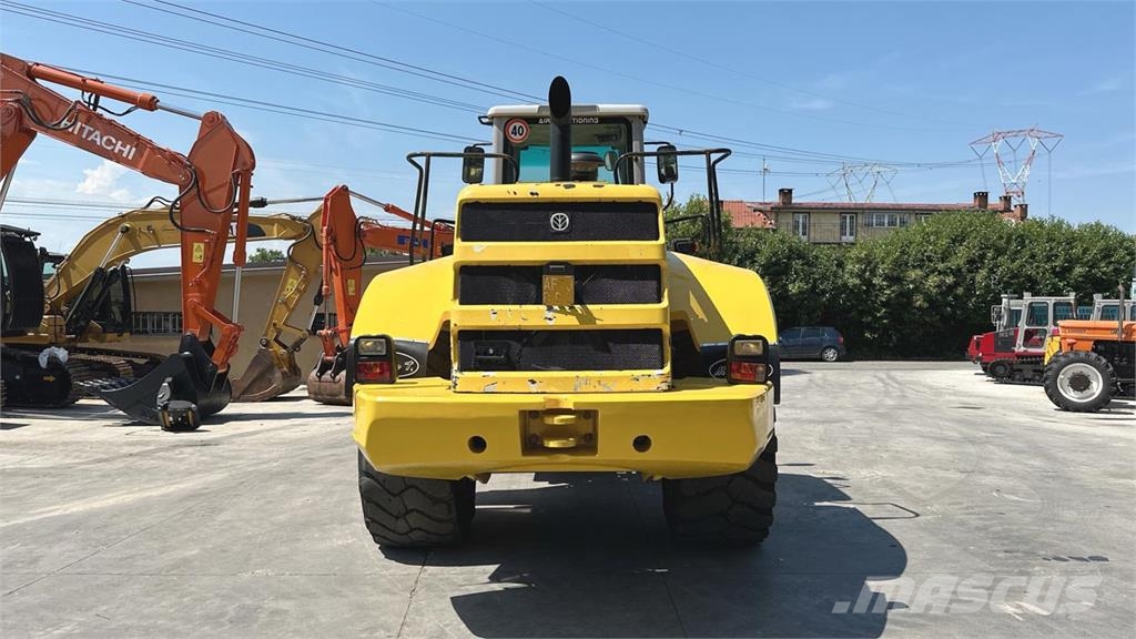 New Holland W270 لوادر بعجل