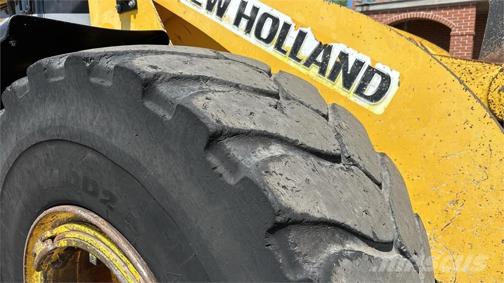 New Holland W270 لوادر بعجل