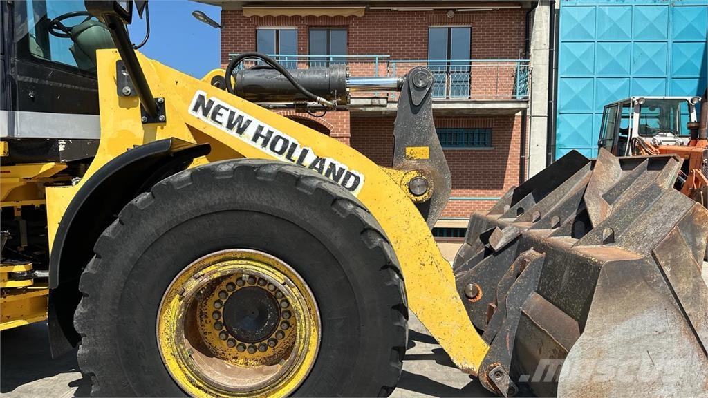 New Holland W270 لوادر بعجل