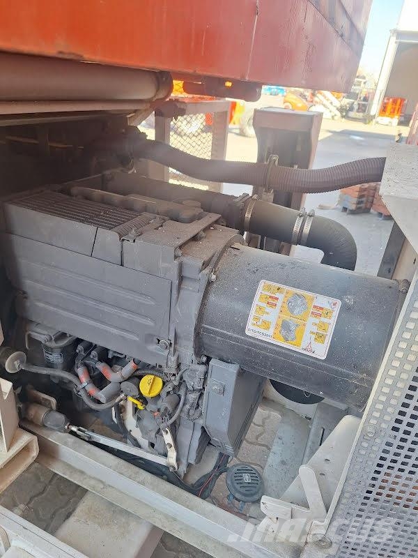Genie GS-3390 RT Nožnicové zdvíhacie plošiny