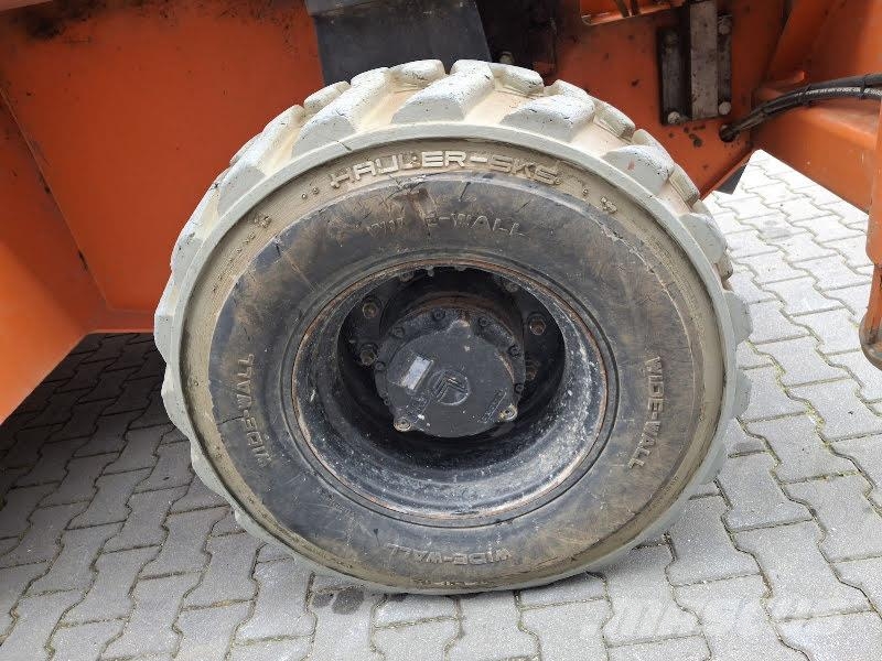 Holland Lift M-250DL27 4WD/P/N Elevadores de tesoura