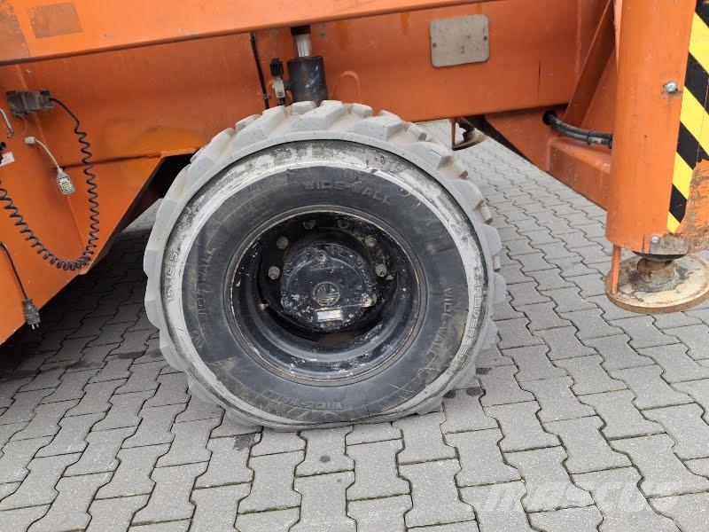 Holland Lift M-250DL27 4WD/P/N Elevadores de tesoura